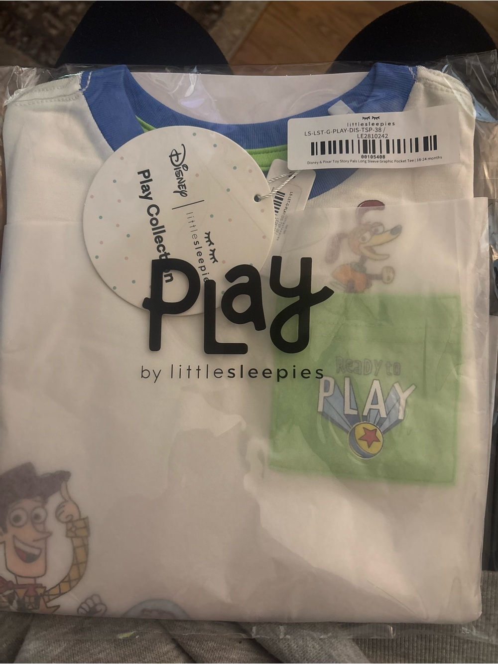 Little Sleepies White Tee with Blue Trim and Green Pocket Graphic